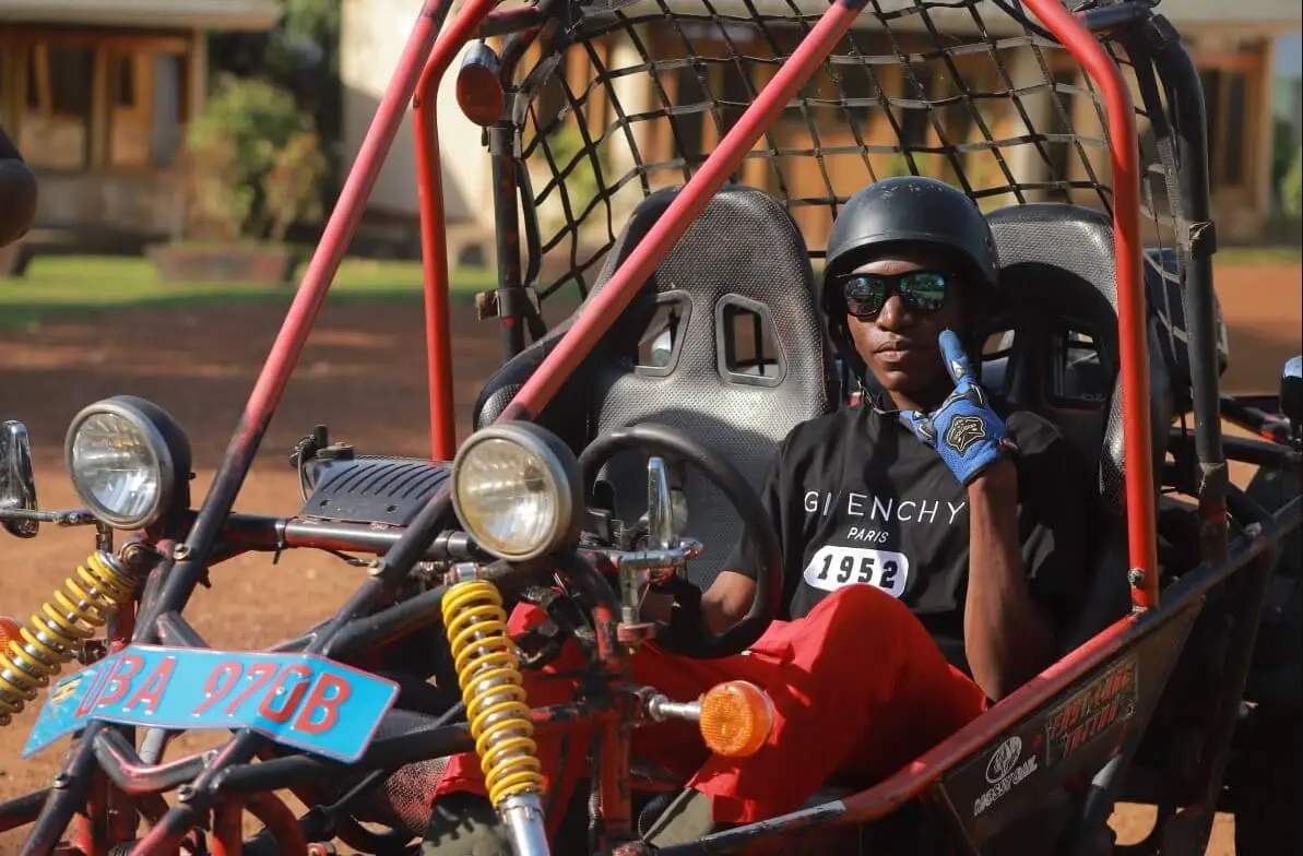 Off-road motorbikes riding through a dirt trail near Tongolo Resort.