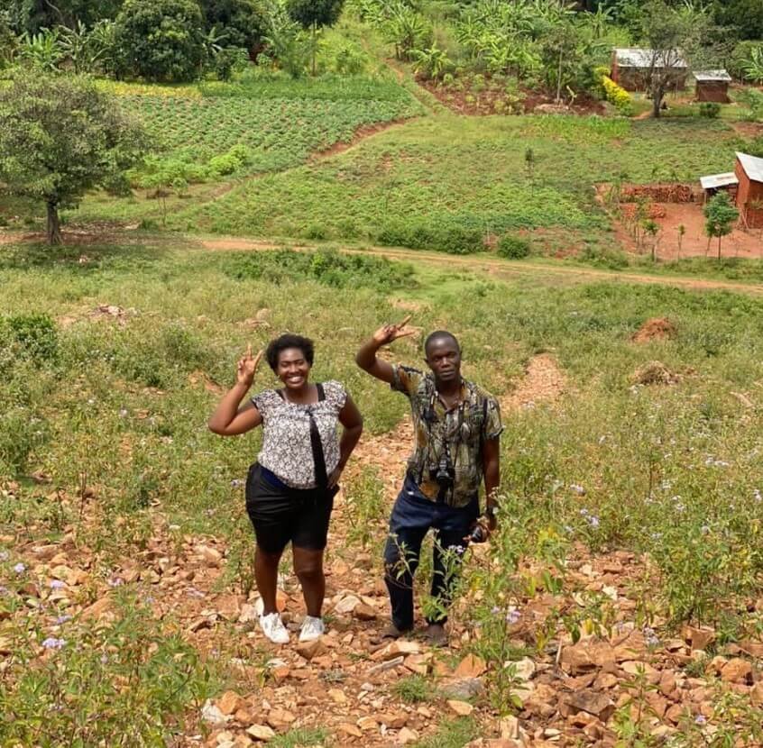 Guests on a guided village walk, exploring the local area near Jinja.